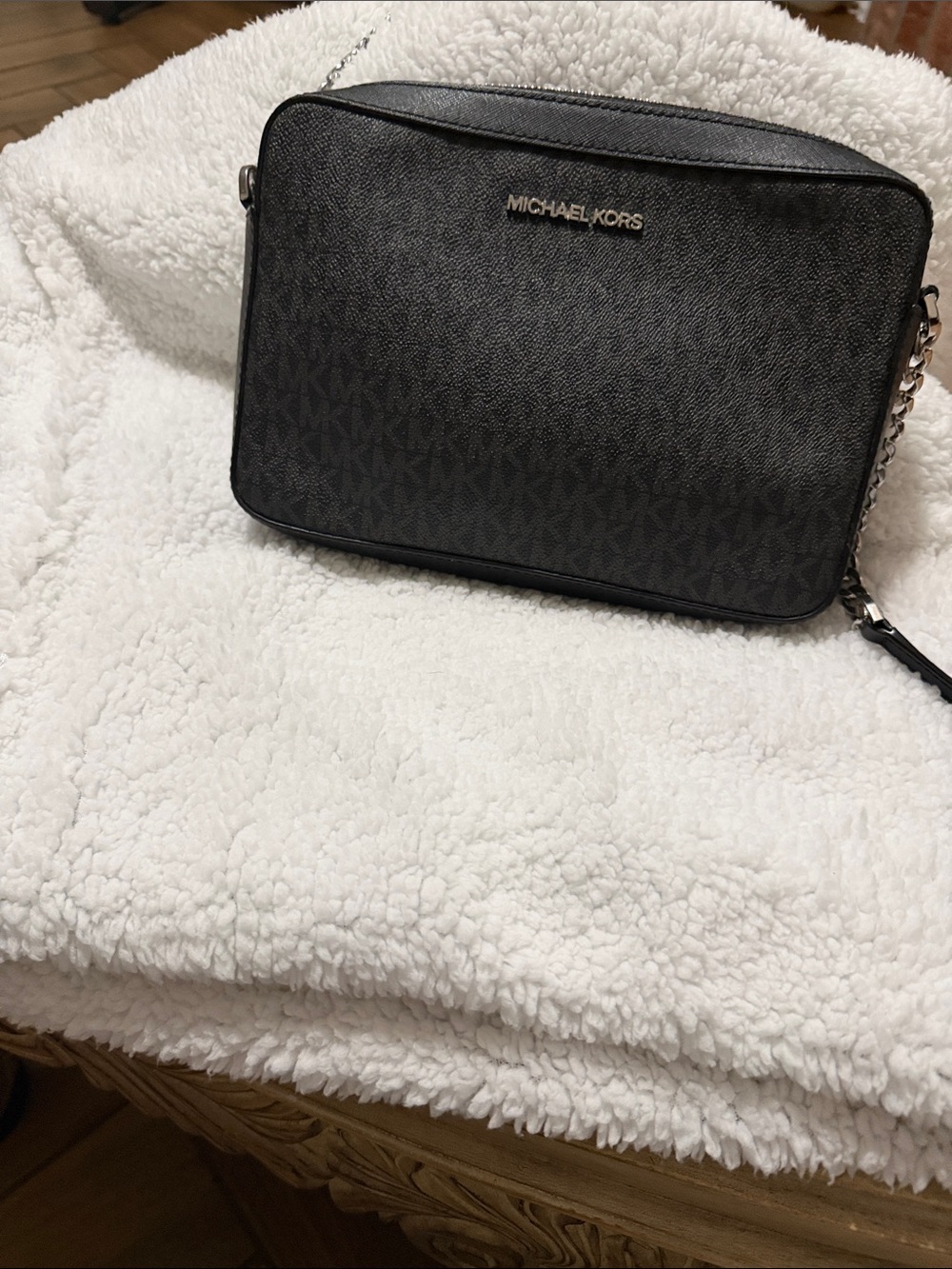 Michael Kors Black Signature Jet-Style Crossbody Bag with Silver hardware.